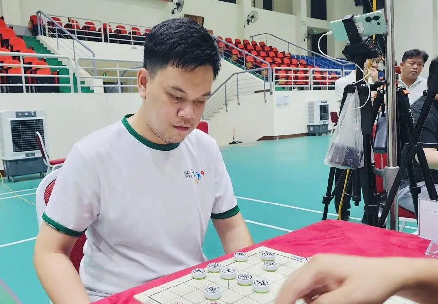 Kỳ thủ Vũ Quốc Đạt của đội cờ tướng TPHCM. Ảnh: VXF