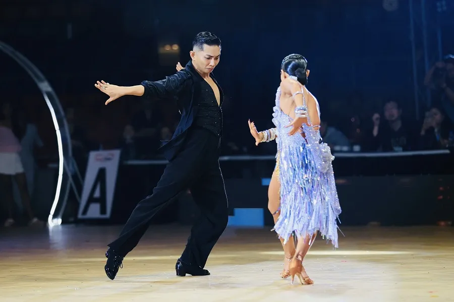 Cặp Phan Hiển, Thu Hương thi đấu tại Philipines. Ảnh: T.S