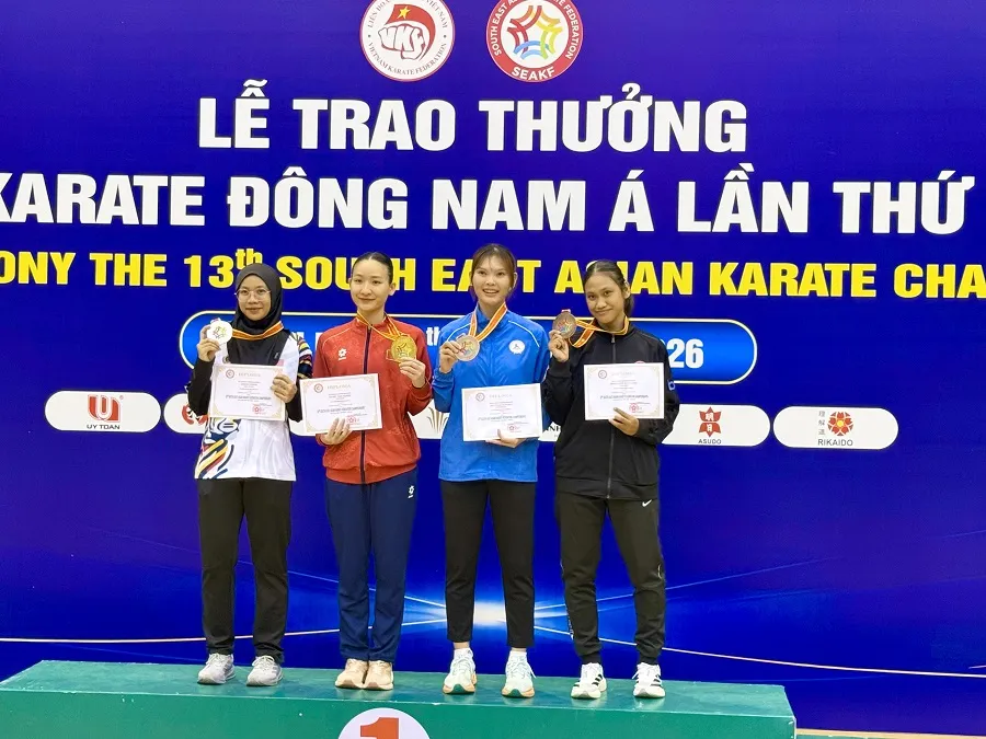 Võ sĩ Hoàng Thị Mỹ Tâm (áo đỏ) vừa giành HCV tại Giải vô địch Đông Nam Á 2026 nhưng không kịp tham dự ASIAD 20 vì chấn thương. Ảnh: MINH CHIẾN
