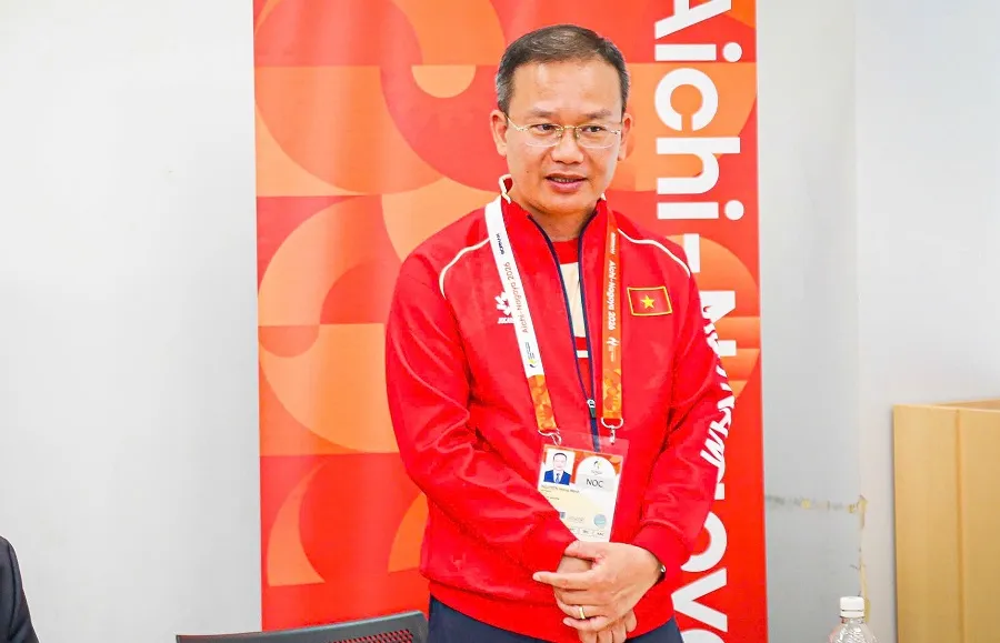 Trưởng đoàn thể thao Việt Nam tại ASIAD 20 Nguyễn Hồng Minh. Ảnh: LƯỢNG LƯỢNG