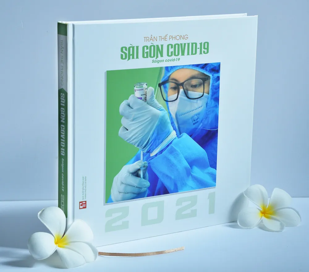 Nghệ sĩ nhiếp ảnh Trần Thế Phong ra mắt sách ảnh Sài Gòn Covid-19 ảnh 1