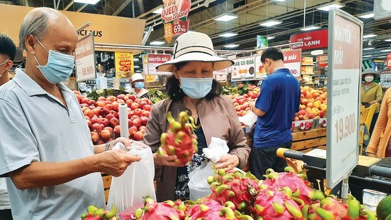 Supermarkets launch several promotion programs to stimulate demand ảnh 1