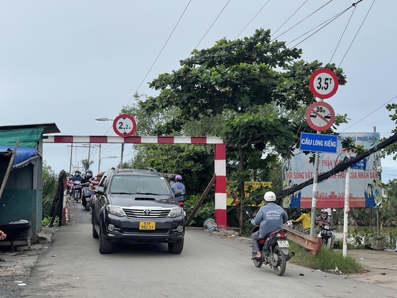 Construction of Long Kieng Bridge resumes as site clearance completed ảnh 1