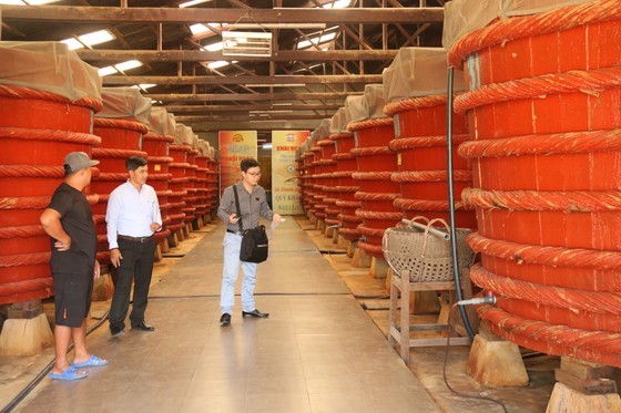 Phu Quoc fish sauce craft becomes national intangible cultural heritage ảnh 3