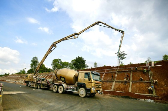 Pouring concrete to prevent landslide