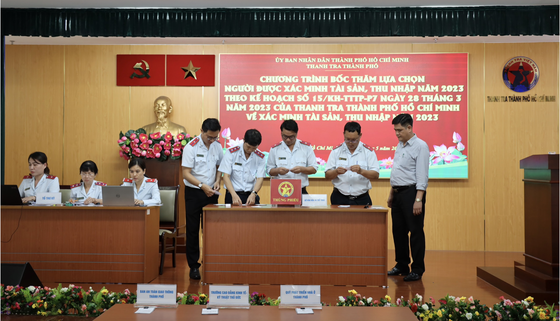 The HCMC Inspectorate perform the lot-drawing ceremony.