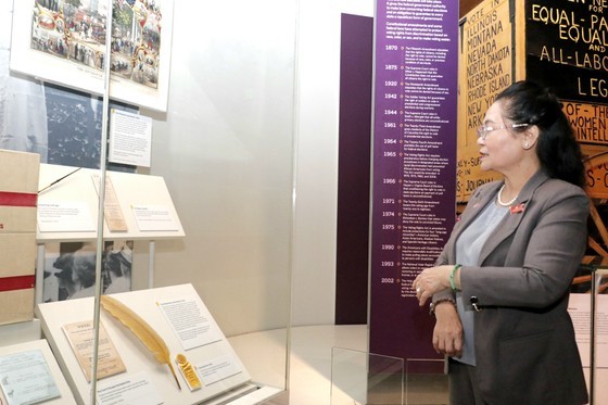 Mrs. Nguyen Thi Le explores artifacts at the National Museum of American History in Washington DC.