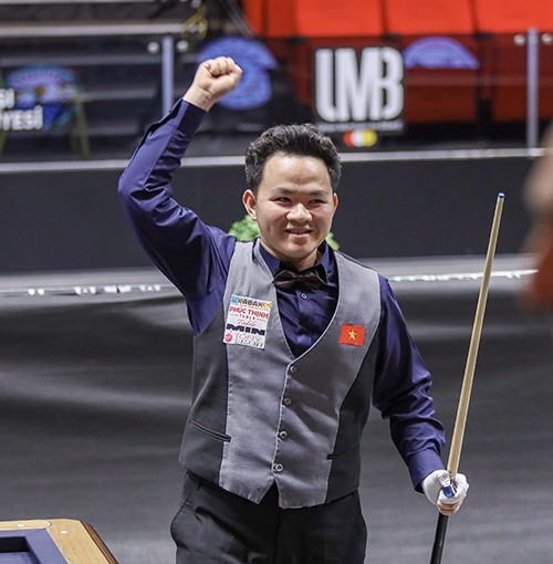 Bao Phuong Vinh expresses his joy of victory.