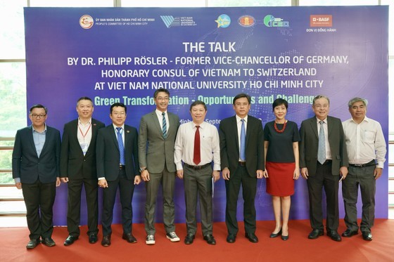 Former Deputy PM of Germany Philipp Rosler and delegates at the event