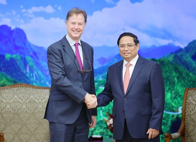 Prime Minister Pham Minh Chinh receives Nick Clegg, President of Global Affairs at Meta, in Hanoi on September 30. (Photo: VNA)