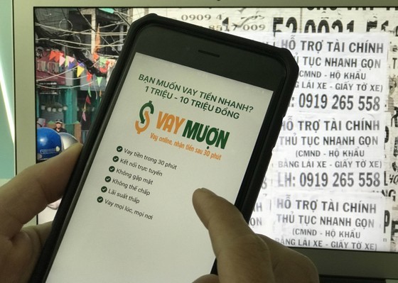 An online money lending app that is hard for users to check its reliability (Photo: SGGP)