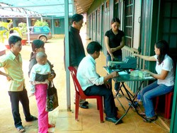 Local people receive compensation for their land being used for bauxite mining