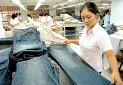 Theo nhận định, hàng dệt may xuất khẩu sẽ rộng cửa hơn vào thị trường Mỹ.Ảnh: ĐỨC THÀNH