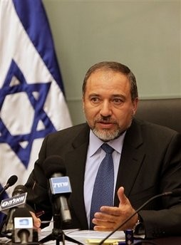 Israeli Foreign Minister Avigdor Lieberman talks during a Yisrael Beiteinu faction meeting at the Knesset, Israel's Parliament.