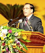 Tổng Bí thư Nông Đức Mạnh đọc diễn văn tại lễ kỷ niệm 64 năm Cách mạng Tháng Tám, Quốc khánh 2-9 và 40 năm thực hiện Di chúc Bác Hồ. Ảnh: MINH ĐIỀN