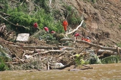 Brazilian rescue teams searched for survivors Saturday after a mudslide struck a small luxury hotel filled with New Year's revelers on an island southwest of Rio de Janeiro, killing at least 19 people and leaving many others missing