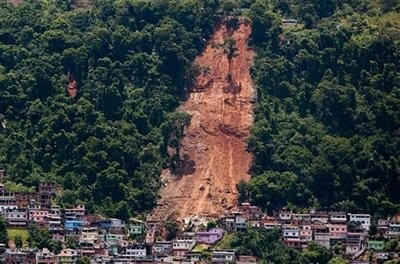 A mountainside is bare after a mudslide in Morro da Carioca, an area in the city of Angra dos Reis, near Rio de Janeiro, Brazil, Saturday, Jan. 2, 2010.