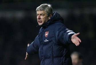 Arsene Wenger gestures during their FA Cup third round football match against West Ham at Upton Park in London on January 3, 2010. AFP PHOTO