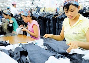 Textile and garments are among Vietnam’s major export earners. The country saw an export growth of 10.7% year on year in December (Photo: SGGP)