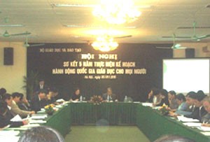 Participants attend a conference to review the five-year implementation of the national education action plan in Hanoi on January 1.