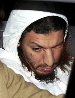 Shoebomber Richard C. Reid is taken from the Massachusetts State Police barracks at Logan International Airport in this December 22, 2001 file photo