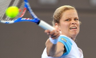 Kim Clijsters hits a forehand return on the way to defeating Andrea Petkovic of Germany in their semi-final match at the Brisbane International tennis tournament on January 8 (AFP photo)