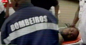 A picture grabbed on the Televisao Publico de Angola channel shows an unidentified player of the Togolese national football team being stretchered to a hospital in Cabinda on January 8, 2010 (AFP photo)