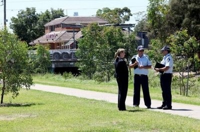 Australian police survey the Melbourne park where Indian student Nitin Garg was stabbed to death on January 2.