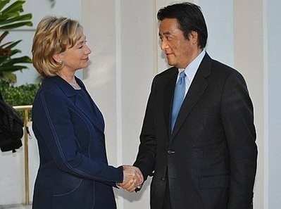 US Secretary of State Hillary Clinton (L) greets Japan's Foreign Minister Katsuya Okada as he arrives for a bilateral meeting at a hotel in Honolulu.