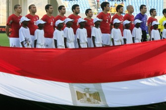 The Egyptian national team pose before their football match against Nigeria in the group “C” stage match at the African Cup of Nations CAN2010 at the Ombaka stadium in Benguela on January 12, 2010. Egypt won 3-1. AFP PHOTO