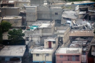 This aerial view shows destroyed building near Port-au-Prince's airport on January 13, 2009, one day after the eartquake hit the Haitian capital. AFP photo