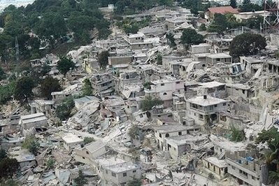 A photo provided by ECHO, shows an aerial view of houses flattened following a major earthquake that hit Port-au-Prince, Haiti, on January 12.