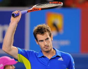Andy Murray waves following his victory over Kevin Anderson of South Africa during their men's singles first round match on day one in Melbourne on January 18, 2010 (AFP photo)
