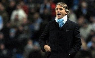 Roberto Mancini reacts during the English Premier League football match against Blackburn Rovers at The City of Manchester stadium, Manchester on January 11, 2010. AFP PHOTO