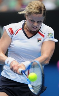 Kim Clijsters hits a return against Tamarine Tanasugarn of Thailand in their women's singles second round match on day three of the Australian Open tennis tournament in Melbourne on January 20 (AFP photo)