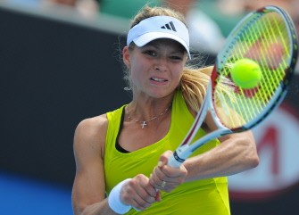 Maria Kirilenko plays a backhand return during her women's singles match against Austrian opponent Yvonne Meusberger on the third day of play at the Australian Open in Melbourne on January 20, 2010 (AFP photo)