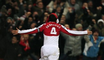 Arsenal captain Fabregas celebrates scoring the equalizer during their English Premier League football match against Bolton Wanderers at the Emirates Stadium, London on January 20, 2010. AFP PHOTO