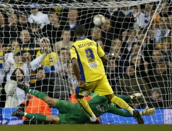 Leeds United's English striker Jermaine Beckford scores his late second goal from the penalty spot past Tottenham's Brazilian goalkeeper Heurelho Gomes during the FA Cup fourth round football match between Tottenham Hotspur and Leeds United at White Hart Lane on January 23, 2010. AFP PHOTO