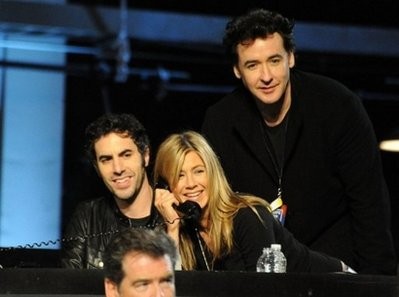 Handout photo from MTV shows Sacha Baron Cohen, Jennifer Aniston and John Cusack at the Hope For Haiti Now