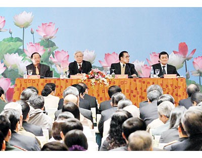Party, State leaders and people attend the meeting reviewing implementation of the campaign to "Study and follow Ho Chi Minh's moral example" held in Hanoi on Jan. 25, 2010.