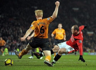 Wayne Rooney (R) scores his fourth goal during the English Premier League football match between Manchester United and Hull City at Old Trafford, on January 23. AFP photo