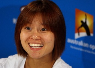 Li Na smiles during a press conference following her victory over Venus Williams on January 27, 2010. Li won 2-6, 7-6, 7-5 to advance to the semi-finals. AFP PHOTO