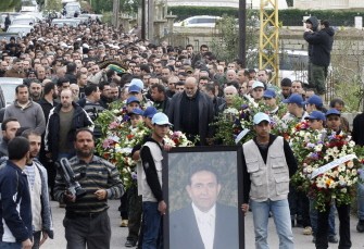 Lebanese mourners carry the body of businessman Hassan Tajeddine, who is one of the victims found at the crash site of the Ethiopian airliner on January 26, 2010. AFP photo