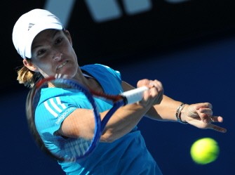 Justine Henin plays a forehand return during her women's singles semi-final match against Chinese opponent Zheng Zieat the Australian Open tennis tournament in Melbourne on January 28, 2010. AFP PHOTO