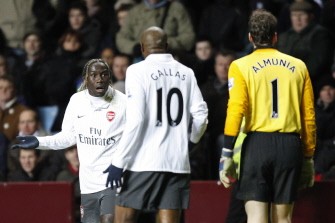 Arsenal defender Bacary Sagna (L) gestures to fellow defender William Gallas during the English Premier League football match between Aston Villa and Arsenal at Villa Park in Birmingham on January 27, 2010. AFP PHOTO