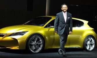 (FILES) Toyota Motor President Akio Toyoda poses next to the company's Lexus luxury brand LF-Ch five-door hybrid during a press preview at the 41st Tokyo Motor Show in Chiba, suburban Tokyo on October 21, 2009. Toyota now faces a widening safety recall. (AFP photo)