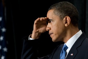 US President Barack Obama blocks the lights as he takes a question at the Republican GOP House Issues Conference in Baltimore, Maryland, on January 29, 2010. AFP PHOTO