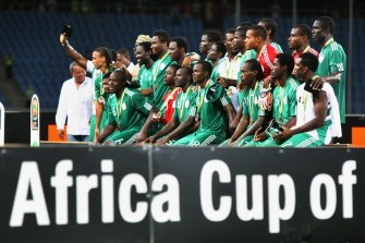 Nigerian footballers celebrate their third-place after their victory over Algeria in the African Cup of Nations CAN2010 at the Ombaka stadium in Benguela on January 30, 2010. AFP photo