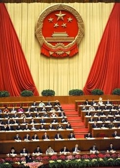 Chinese Premier Wen Jiabao delivers his speech to delegates at the opening session of the National People's Congress inside the Great Hall of the People in Beijing on March 5, 2010.