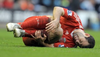 Javier Mascherano reacts after being fouled during his team's English Premier League football match against Blackburn Rovers at Anfield, Liverpool on February 28, 2010. AFP PHOTO